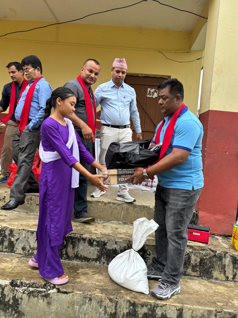 Stationary, Warm Clothes and Dashain Food Material Distribution  and Menstrual Hygiene Training Program